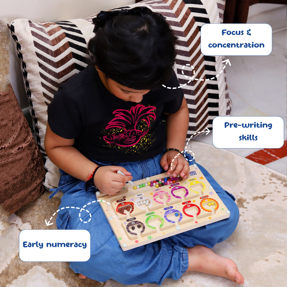 Child playing with a educational puzzle toy on a couch