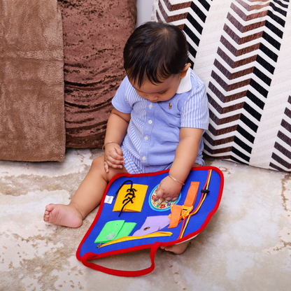 Soft fabric busy board for toddlers fine motor skills